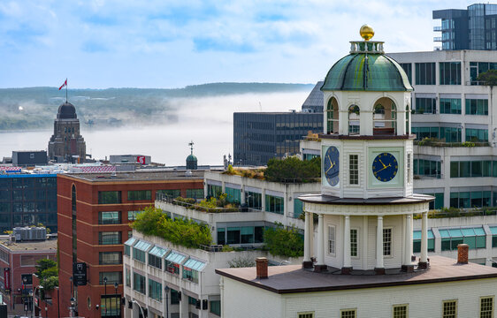 Halifax, Nova Scotia, Canada, August 18, 2024: View from the citadel with the Old Town Clock and the bay in a foggy morning