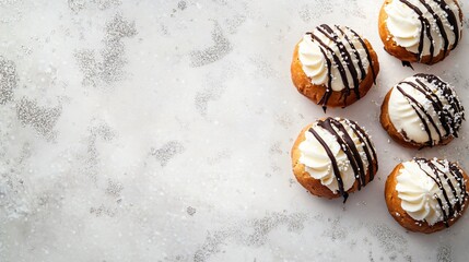 Vanilla cream profiteroles with chocolate drizzle, isolated on a light background with silver sparkles and delicate lace