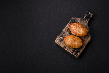 Delicious fresh fried minced fish cutlets with spices and herbs