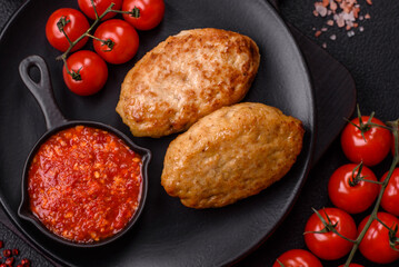 Delicious fresh fried minced fish cutlets with spices and herbs