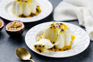 Panna cotta dessert with fresh passion fruit sauce