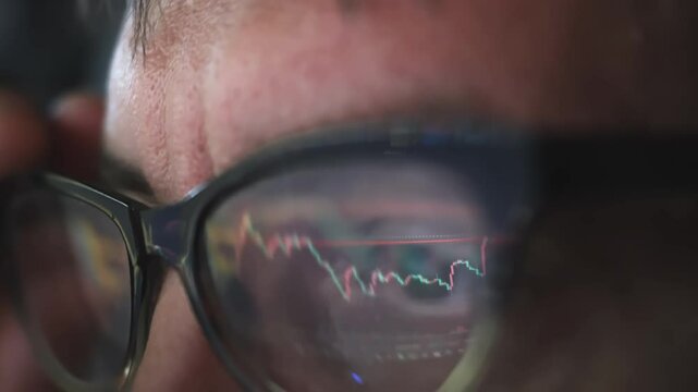 Stressed trader watching stock market crashing