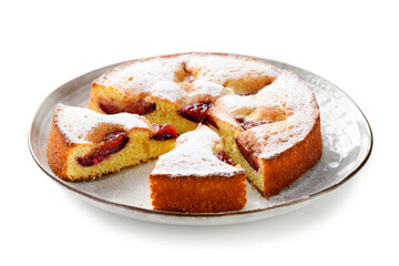 Freshly baked sliced plum ​​pie or cake. isolated on white background