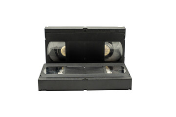 Obraz premium A black VHS tape is laying on a white background. The tape is empty and has no visible content