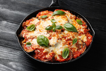 Traditional homemade Aubergine parmigiana with tomato sauce parmesan and mozzarella cheese
