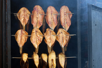 Wędzone ryby w wędzarni nad morzem.  © FotoDax