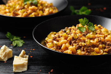 Cheeseburger Pasta with beef, melted cheese, gherkins and pasta