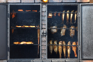 Wędzone ryby w wędzarni nad morzem.  © FotoDax
