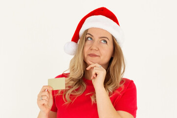 Thoughtful and sly attractive girl stole dads credit card and thinking how waste money, imaging...