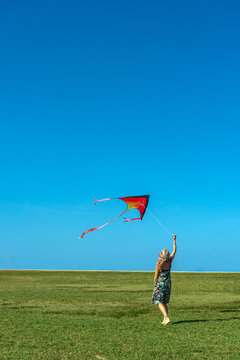Woman flying a kite 