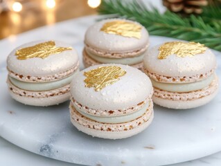 Fototapeta premium Elegant gold-accented macarons on a marble plate