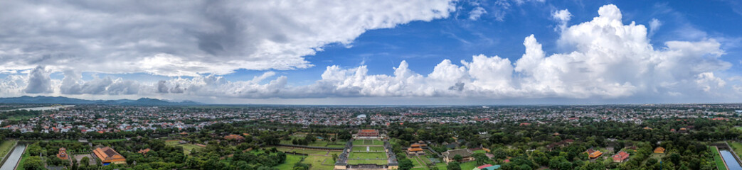 Aerial view of The Imperial City of Hue, Vietnam. It was designated as a UNESCO World Heritage Site in 1993. The grounds are protected by fortified ramparts and ringed by a moat. Vietnamese flag flies
