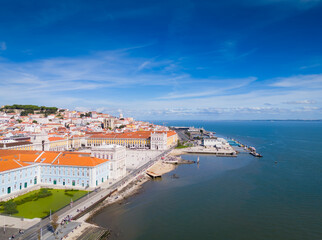 Aerial view of Lisbon city center and Praca do Comercio in Baixa district in Lisbon old town, Portugal. Panoramic drone photo of central square 