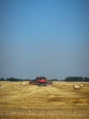 combine harvesting wheat
