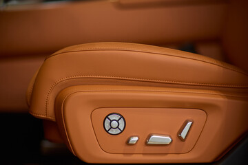 Explore the intricate functions of premium luxury car seat control buttons in detail
