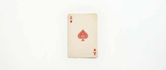 Obraz premium Worn Playing Card with Bent Corners on White Background
