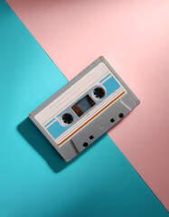 Fototapeta premium vintage cassette, isolated on a Soft blue and Pink Pastel