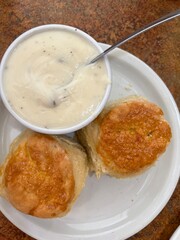 Traditional American-style country breakfast with biscuits and gravy at a local diner restaurant in Oakdale, California, USA.