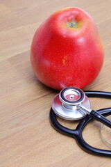 Apple as a symbol of taking care of your health, regular check-ups and taking care of yourself 
and your health.
