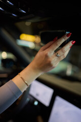 Discover a modern car interior with a stylish hand adjusting mirror for added functionality