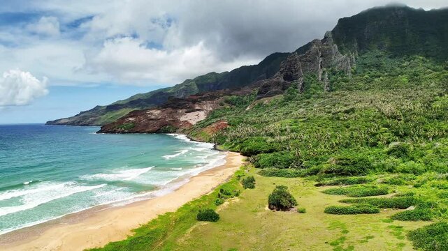 Drone Marquesas Islands. Aerial view Nuku Hiva island in French Polynesia. Tropical beach, palm trees and clear ocean water. Exotic travel vacation getaway, romantic paradise tourism destination. 