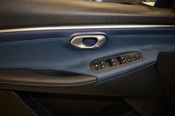 A car door with trim showcasing automotive design details