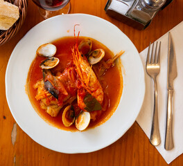 Seafood monkfish tail with shrimp and mussels