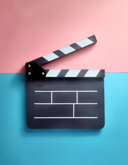 Movie gripper. Movie clipboard, isolated on a Soft blue and Pink Pastel