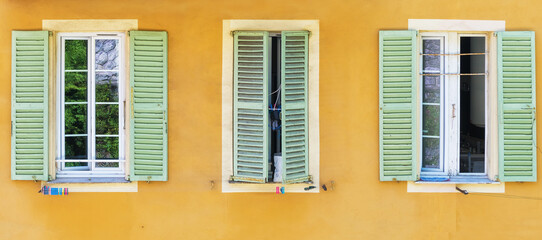 Fototapeta premium Italian shutter windows with decoration