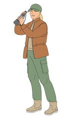 women birdwatching with spotting scope  in outdoor clothes