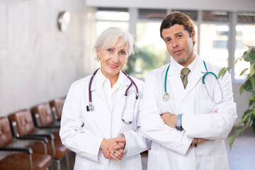 Fototapeta premium Portrait of two doctors at the office of medical clinic