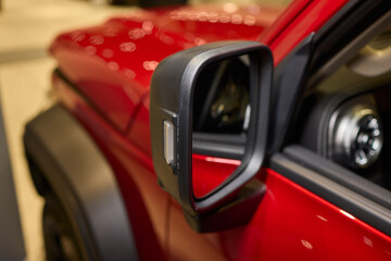 Fototapeta premium An elegant closeup shot of a sleek car side mirror showcasing its design and details