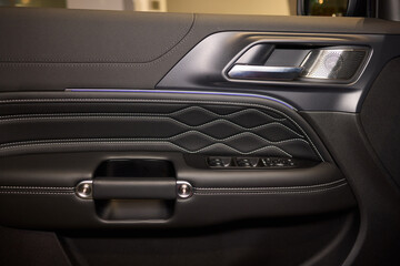 A car door with trim showcasing automotive design details