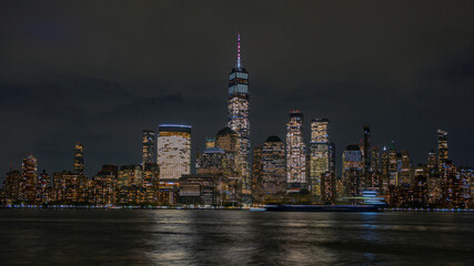 Obraz premium Evening Manhattan. New York night panorama. World Trade Center at night. Skyline of lower Manhattan with World Trade Center.