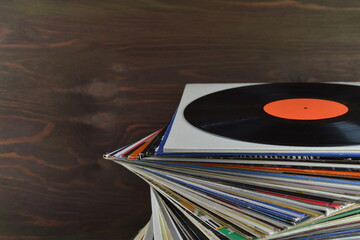 stack of old black vinyl records