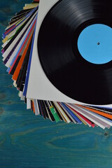 stack of old black vinyl records