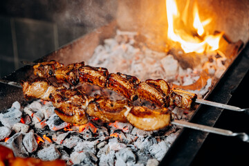 Grilled meat skewers roasting over charcoal flames, capturing the essence of BBQ perfection