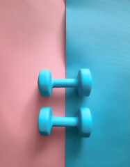 dumbbells, isolated on a Soft blue and Pink Pastel