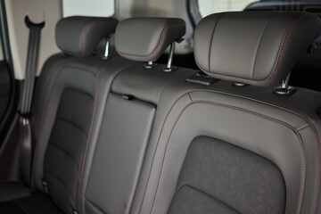 Car back seat with headrest and arm rest, a comfortable automotive fixture