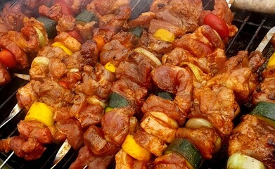 Close-up of a grilled skewer with a variety of vegetables and meat, perfectly cooked. The vibrant colors barbecue