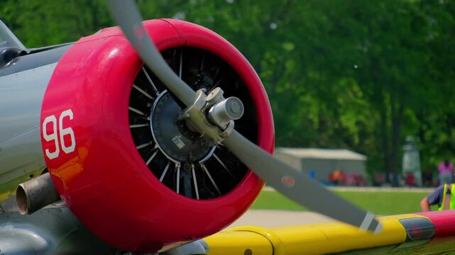 Vintage War War 2 United States Warbird Airplane Startup on Airfield on show. Close up 