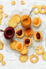 Traditional Christmas Linzer Cookies on a Christmas rustic background