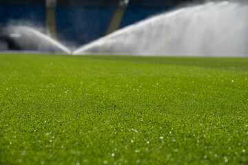 football pitch grass - care and watering - perfect green grass for footballers