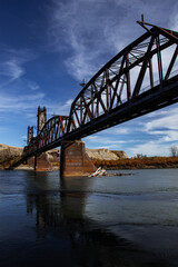 Obraz premium Beautiful view looking up at the Fairview Lift Bridge and Tunnel during a sunny day in North Dakota, United States.