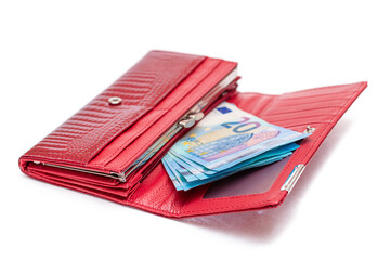 Opened Red Women Purse with 20 Euro Banknotes Inside - Isolated on White Background. A Wallet Full of Money Symbolizing Wealth, Success, Shopping and Social Status - Isolation