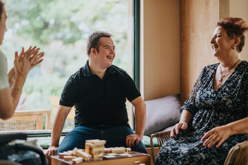 A joyful moment featuring a boy with Down syndrome, a girl in a wheelchair, and an elderly woman...