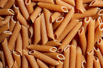 Uncooked Whole Grain Penne Rigate Pasta: A Culinary Canvas of Whole Wheat Macaroni, Creating a...