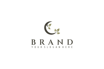 crescent moon logo with combination of leaf plants in flat design style