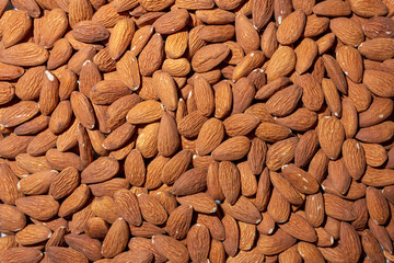 Scattered Almonds. Background from Almond Nuts. Natural High-Calorie Snacks