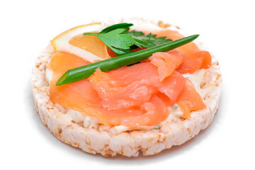 Rice Cake Sandwich with Fresh Salmon, Lemon and Greens - Isolated on White Background. Diet Food. Quick and Healthy Sandwiches. Crispbread with Fresh Fillings. Healthy Dietary Snack